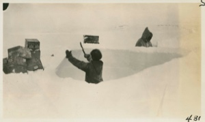Image of Snow house being built